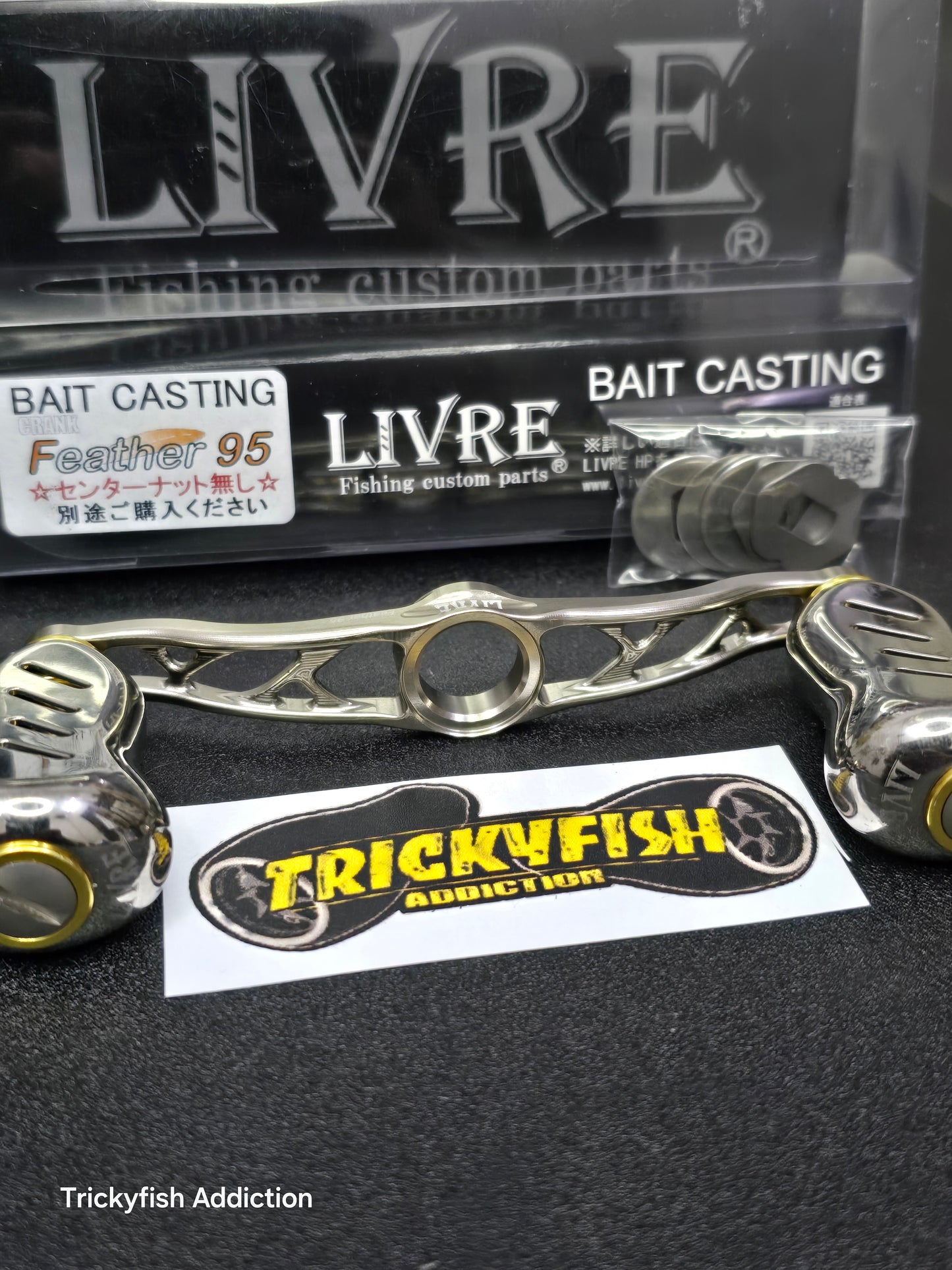 [USED B] Livre Feather 95 Titanium/Gold
