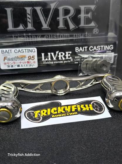 [USED B] Livre Feather 95 Titanium/Gold